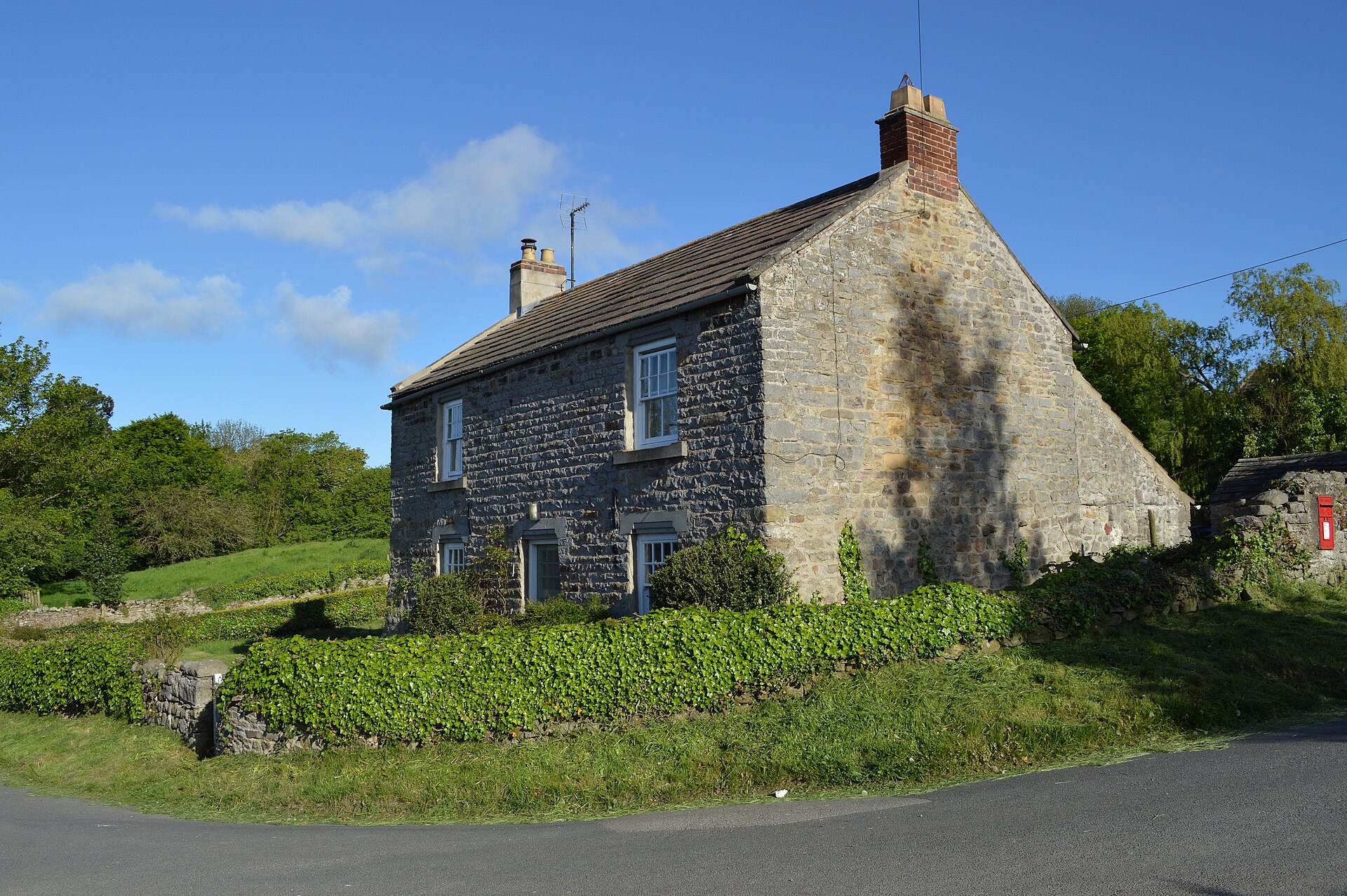 Traditional stone cottage with a slate roof